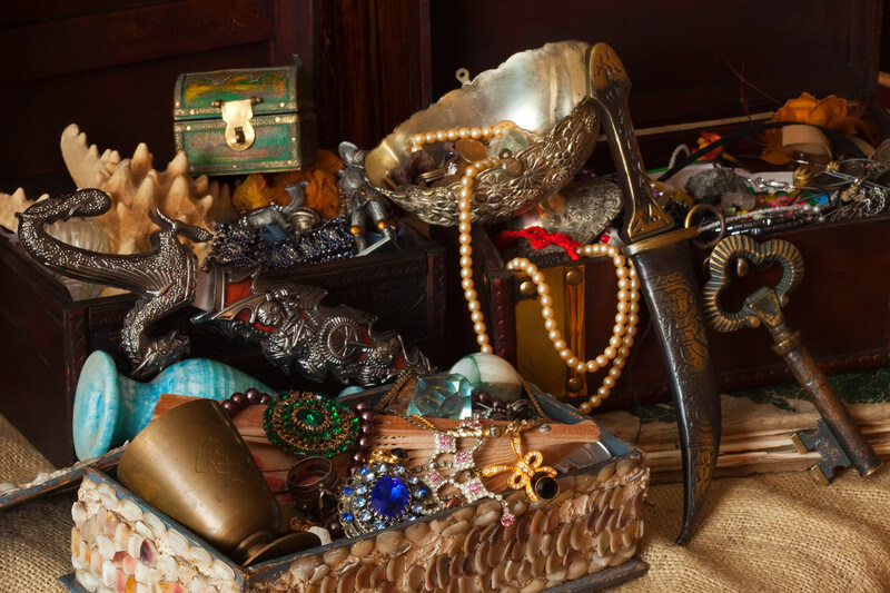 image showing a variety of items for a garage sale including jewelry